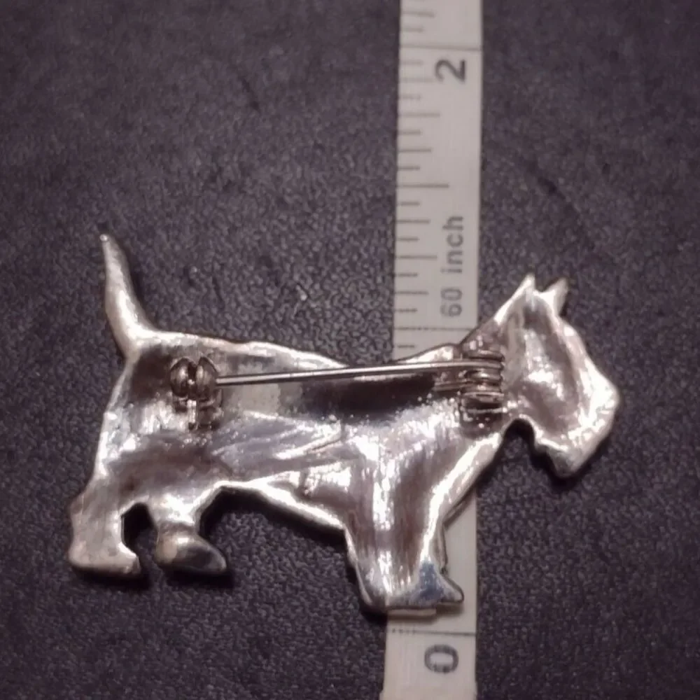 Silver tone terrier dog brooch